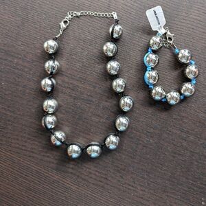 Silver tone black corded choker and NWT blue corded bracelet set 25$for the set
